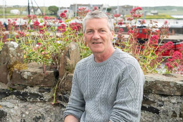 Michael Cecil, pictured, is chairman of Rathlin Development Group and is a
passionate advocator for increasing sustainability on the island