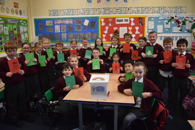 Edenderry PS pupils with their art work