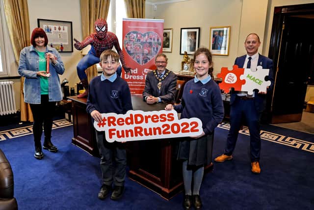Julie McAllister, Graham Ross as Spiderman, Councillor William McCaughey, Mace RM Alastair Patterson and pupils from Dunclug Primary School Ballymena, Ethan and Demi,