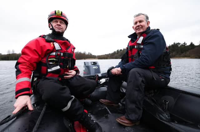 Edwin Poots with John Russell from Lagan Search and Rescue in Hillsborough. Photo by Kelvin Boyes / Press Eye.