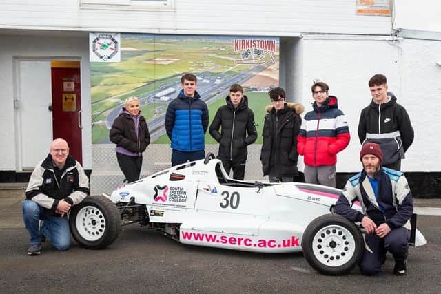 L-R SERC Motorsport Engineering Lecturer Stuart Parker, with Level 2 and Level 3 Motor Sport Engineering students Jessica Robinson, Joshua Parsons, James Boyd, Colin Johnston, Ross Hanlon, Conor Devlin, and Stephen Wishart, Lecturer and driver of the Formula Ford 1600 which recently secured the Championship title in Class 13 for Sprint cars