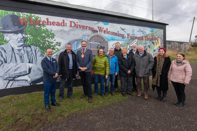 The Mayor, Councillor William McCaughey, with guests at the unveiling of the artwork in Whitehead.