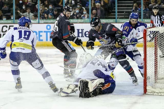 Belfast Giants' Mark Cooper and Ben Lake with Coventry Blaze's CJ Motte during an Elite Ice Hockey League game at the SSE Arena, Belfast.   Photo by Darren Kidd/Presseye