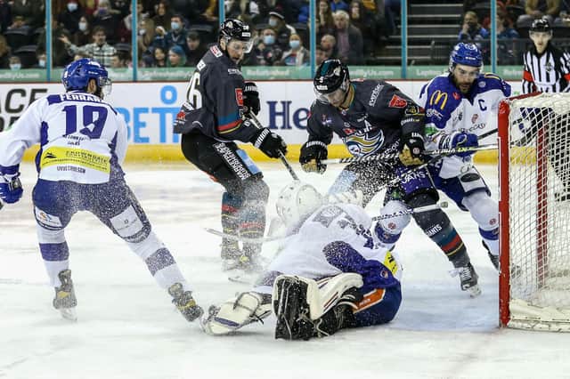 Belfast Giants' Mark Cooper and Ben Lake with Coventry Blaze's CJ Motte during an Elite Ice Hockey League game at the SSE Arena, Belfast. Photo by Darren Kidd/Presseye