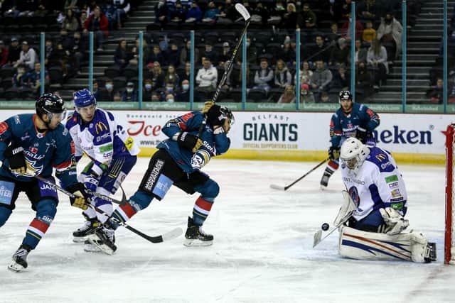 Belfast Giants' Jordan Boucher with Coventry Blaze's CJ Motte during the Elite Ice Hockey League game at the SSE Arena, Belfast.   Photo by Darren Kidd/Presseye