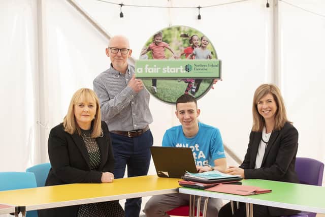 Education Minister Michelle McIlveen (left) with Paul Johnston (MBE), club project manager, student Jack Mawhinney and Mary Montgomery,Fair Start Panel.