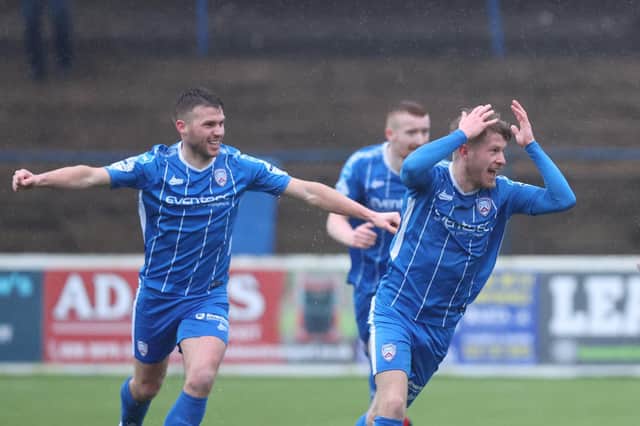 Lyndon Kane celebrates after heading Coleraine in front