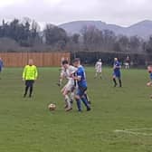 Rangers Reserves player Shea Byrne holds up the ball against Hanover Reserves