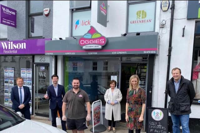 Upper Bann MP Carlan Lockhart meets with staff at Oggies Dessert Bar following armed robbery in the Banbridge business