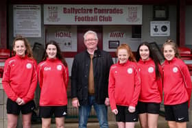 Cllr Michael Stewart with the five players Love Ballyclare will be sponsoring for the season.