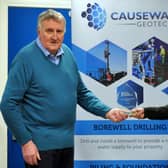 Ivor receiving his award from Darren Mahony, Director at Causeway Geotech Limited