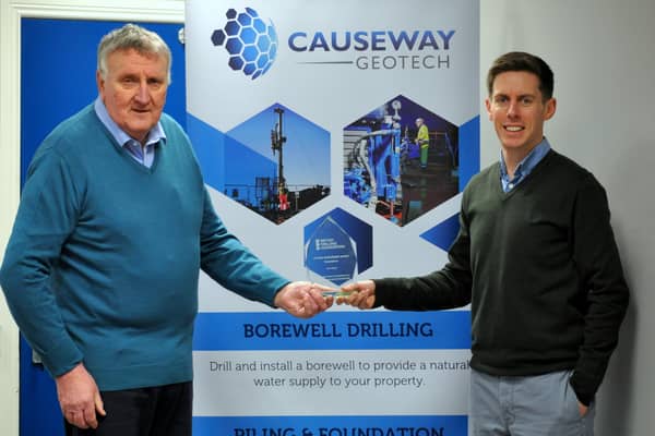 Ivor receiving his award from Darren Mahony, Director at Causeway Geotech Limited