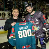 Carl Frampton presents Mark Garside with a jersey on his 800th game ahead of last Saturday’s fixture in Belfast. He is only the seventh player in league history to make this milestone