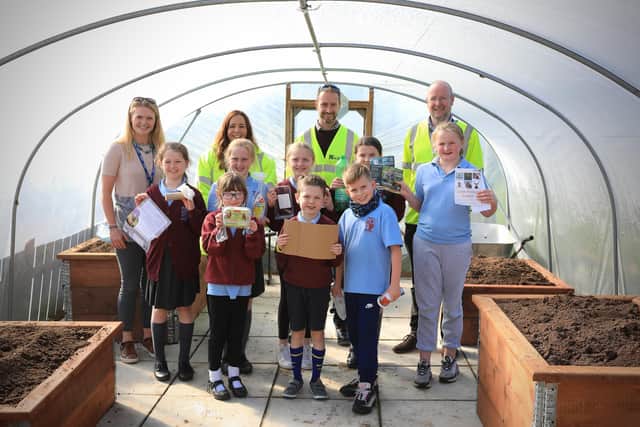 Miss Brown, Damhead Controlled Primary, pictured with Ciara Magill, firmus energy and Kier colleagues Jamie Edmonds and Micheol O’Gallcobhair alongside some of Miss Brown’s primary 6 pupils
