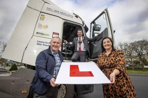 Lord Mayor Glenn Barr, Chair of Economic Development & Regeneration Committee Councillor Declan McAlinden and Enterprise Development Manager Sarah-Jane Macdonald at the ABC HGV Training and Employment Academy which will fully fund 45 HGV training positions and guarantee an interview with a local employer.