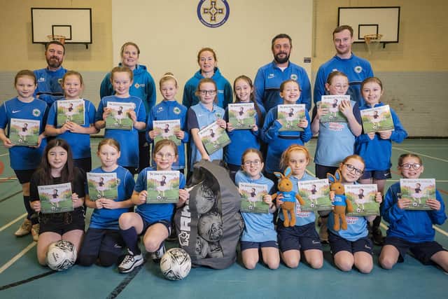 Electric Ireland Competition winner Marie Therese Quinn and the St. Mary's Girls team enjoy a special training session at Edmund Rice College, Glengormley, delivered by Northern Ireland Women's captain Marissa Callaghan and Gail Redmond, Women's Development Officer at the Irish FA.