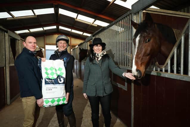 Pictured (left to right) John Rymer, sales and marketing consultant at Bluegrass Horse Feed, Bluegrass customer Stuart Crawford of Crawford Brothers Racing and Claire Rutherford, sales and marketing director at Down Royal Racecourse