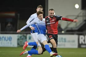 Glenavon’s Jack O’Mahony challenges Crusaders’ Jude Winchester. PICTURE: Stephen Hamilton/Inpho