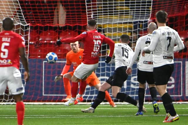 Lee Lynch fires home the winning goal in Larne’s victory over Glentoran. Pic by PressEye Ltd.