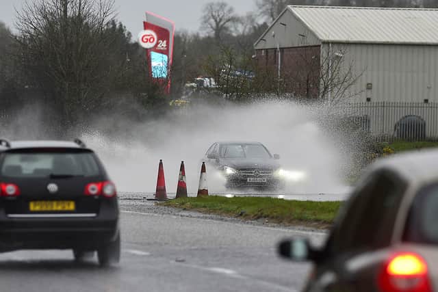 The A1 road  near Banbridge was flooded by heavy rain on Sunday. Picture: Arthur Allison/Pacemaker Press.
