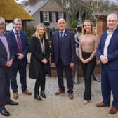 Martin Agnew, joint managing director of Henderson Group, with Alan Abraham and Charlene McGonagle from Henderson Wholesale, Gary Reid and his daughter Holly Reid, and logistics director, Pat McGarry.
