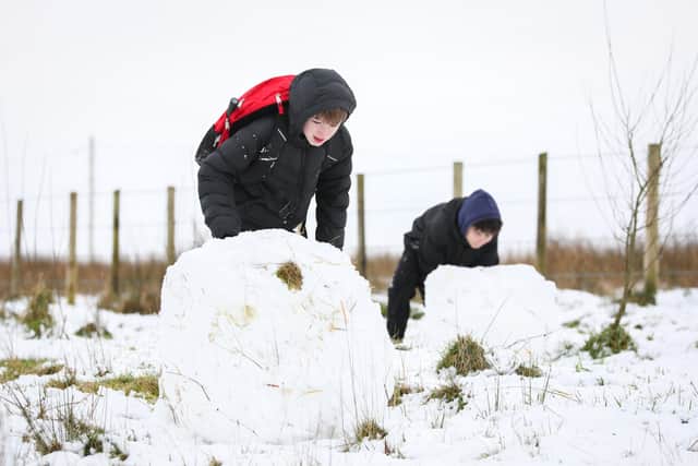 Youngsters enjoying the snowfall at the end of last week on Divis and Black Mountain,  Belfast. Picture: Matt Mackey / Press Eye.
