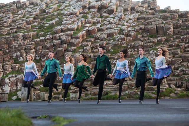 Tourism Ireland is teaming up with Riverdance to promote Northern Ireland and the island of Ireland as part of the Riverdance 25th Anniversary Tour in the United States and Canada this year. Some of dancers performing at the Giant’s Causeway during filming for Tourism Ireland’s video. Pics by Chris Roberts