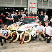 Hillsborough's Daniel Harper, pictured far right, with his team-mates and garage crew. Daniel will be competing with factory support from BMW this season, with a fantastic 2022 race programme seeing him return to the Nürburgring Endurance Series as well as tackle the GT World Challenge Europe for the first time