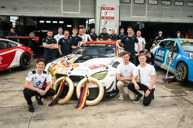 Hillsborough's Daniel Harper, pictured far right, with his team-mates and garage crew. Daniel will be competing with factory support from BMW this season, with a fantastic 2022 race programme seeing him return to the Nürburgring Endurance Series as well as tackle the GT World Challenge Europe for the first time