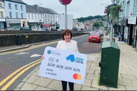 Upper Bann MLA Diane Dodds with the High Street Voucher, issued by the Department for the Economy during the COVID19 pandemic to urge people to Shop Local.