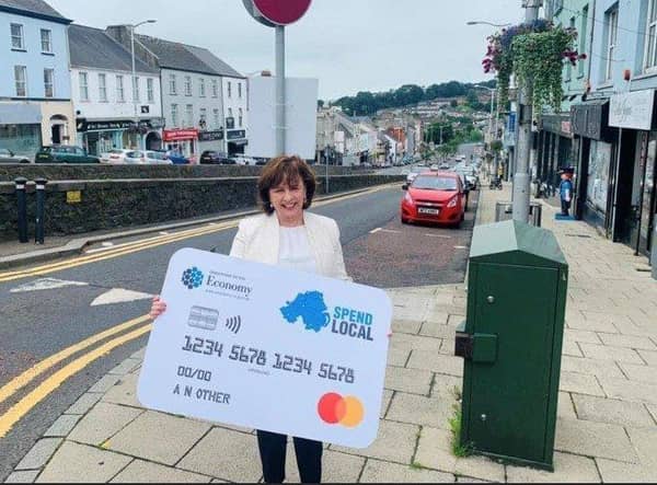 Upper Bann MLA Diane Dodds with the High Street Voucher, issued by the Department for the Economy during the COVID19 pandemic to urge people to Shop Local.