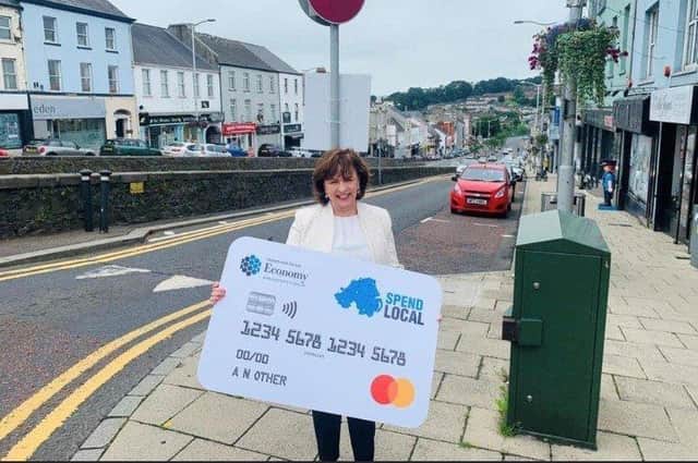 Upper Bann MLA Diane Dodds with the High Street Voucher, issued by the Department for the Economy during the COVID19 pandemic to urge people to Shop Local.