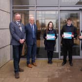 Mayor Cllr William McCaughey, Ballymena Academy Principal Stephen Black, Mrs Moran and  the winners of the secondary category in the 2022 Energy Innovation Challenge from the school.