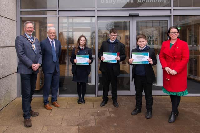 Mayor Cllr William McCaughey, Ballymena Academy Principal Stephen Black, Mrs Moran and  the winners of the secondary category in the 2022 Energy Innovation Challenge from the school.
