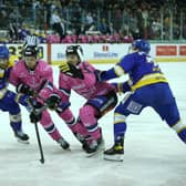 Belfast Giants’ Scott Conway and David Goodwin with Fife Flyers’ James Isaacs during Saturday’s Elite Ice Hockey League game at the SSE Arena, Belfast