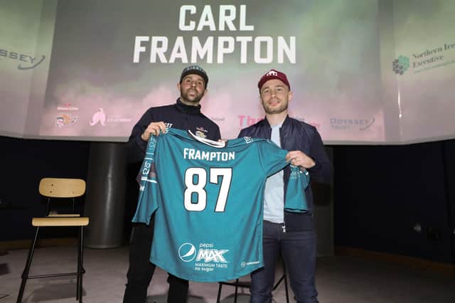 Jeff Mason, assistant coach, Belfast Giants presents Northern Ireland boxing legend, Carl Frampton with a custom Belfast Giants jersey after speaking at an intimate event in W5, Belfast for past and present participants of the Odyssey Ice Academy. Picture by Kelvin Boyes, Press Eye.