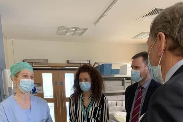 Staff from Lagan Valley Hospital chat with Professor Mortensen