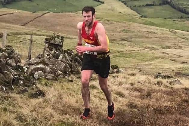 Seamus Lynch (Newcastle AC) powering to top of Glenariff and victory in the last 'Spud Run' in 2020