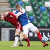 Portadown striker Harry Anderson (left) is hoping to build on recent first-team minutes for his hometown team. Pic by Pacemaker.