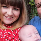 Bertie with his parents Emma and Mark.