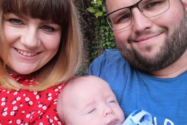 Bertie with his parents Emma and Mark.