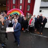 Health Minister Robin Swann pictured at Carnlough Fire Station last week with Maggie's mother, Sheenagh Black and members of the local community. Photo by Kelvin Boyes / Press Eye.