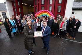 Health Minister Robin Swann pictured at Carnlough Fire Station last week with Maggie's mother, Sheenagh Black and members of the local community. Photo by Kelvin Boyes / Press Eye.