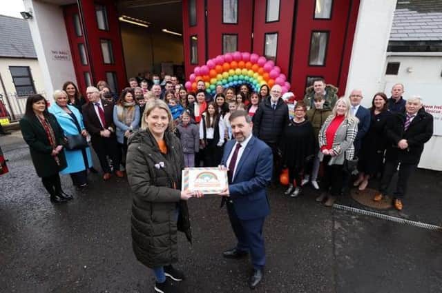 Health Minister Robin Swann pictured at Carnlough Fire Station last week with Maggie's mother, Sheenagh Black and members of the local community. Photo by Kelvin Boyes / Press Eye.