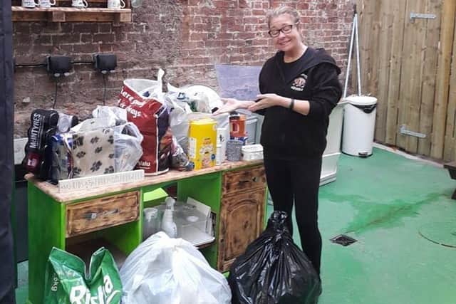 Gillian Gardiner, of The Potato Bar in Lurgan, Co Armagh with just some of the donated products to help pets in Ukraine.