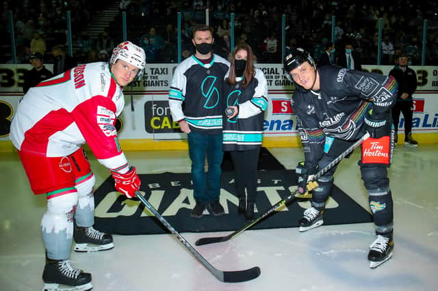 Mark Richardson (Cardiff Devils), Stephen Somers (co-founder, Marketplace SuperHeroes), Caitlin Hunter (Marketplace SuperHeroes) and Mark Cooper (Belfast Giants) on the ice at the SSE Arena