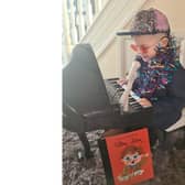 Donnacha McCaughey, aged five, from Lurgan who dressed up as Rocket Man Elton John for World Book Day.