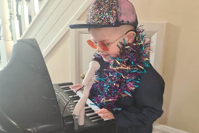 Donnacha McCaughey, aged five, from Lurgan who dressed up as Rocket Man Elton John for World Book Day.