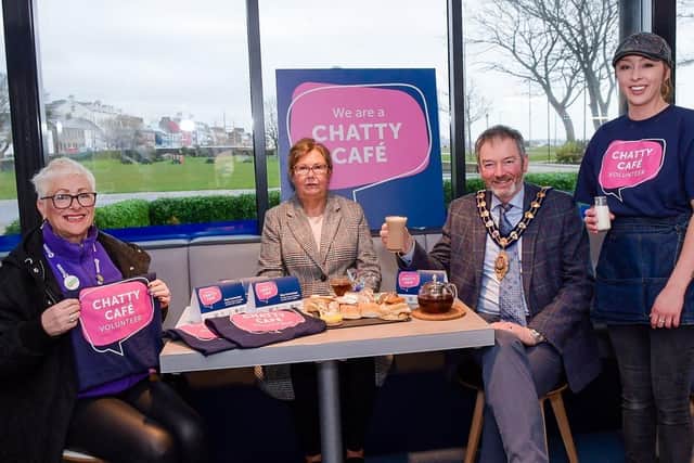 Wenda Gray, volunteering support officer, Volunteer Now; Marjorie Hawkins, chair of Mid and East Antrim Loneliness Network; the Mayor, Councillor William McCaughey and a member of staff from the Clock Tower Cafe.
