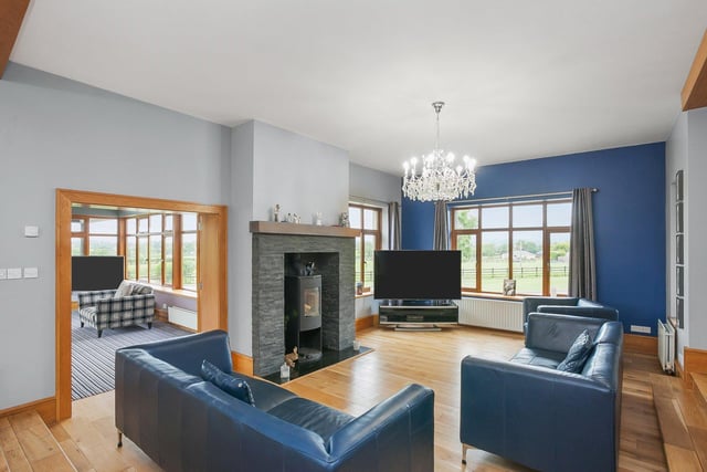 There is oak flooring throughout the spacious open-plan living area.